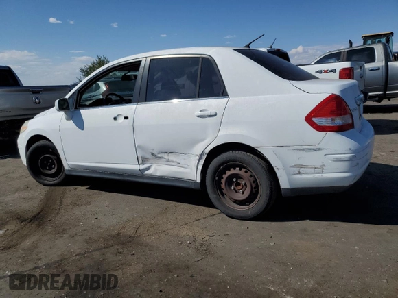 2009 Nissan Versa 1.8 S with VIN 3N1BC11E49L371066, listed as a Copart auction lot 57502474 with 157,127 mi miles and Salvage Title. Bid and sale history available at carsss.com. Image 2.