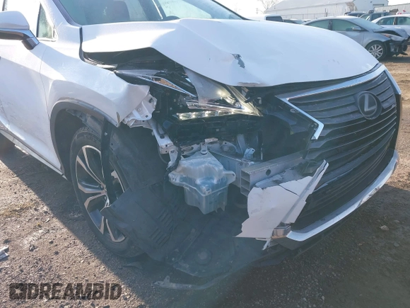 2017 Lexus RX with VIN JTJBZMCA8H2017619, listed as a IAAI auction lot 41953769 with 130,164 mi miles. Bid and sale history available at carsss.com. Image 6.