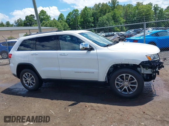 2014 Jeep Grand Cherokee Limited with VIN 1C4RJFBG3EC350648, listed as a IAAI auction lot 42523221 with 125,447 mi miles and . Bid and sale history available at DreamBid. Image 14.