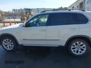2013 BMW X5 xDrive35i z VIN 5UXZV4C5XD0B10732, wystawiony jako IAAI lot #41576548 z przebiegiem 131 237 mil mil oraz . Historia ofert i sprzedaży dostępna na DreamBid. Obrazek 14.