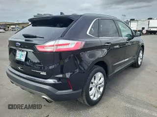 2020 Ford Edge Titanium with VIN 2FMPK3K99LBA73839, listed as a IAAI auction lot 42843885 with 92,381 mi miles and . Bid and sale history available at DreamBid. Image 18.