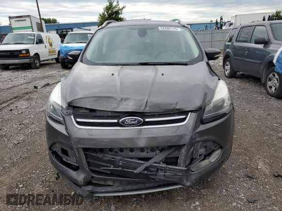 2015 Ford Escape Titanium with VIN 1FMCU9J96FUB32972, listed as a Copart auction lot 62886145 with 215,769 mi miles and Salvage title. Bid and sale history available at DreamBid. Image 5.
