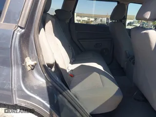 2007 Jeep Grand Cherokee Laredo with VIN 1J8HR48PX7C660601, listed as a IAAI auction lot 41652509 with 131,556 mi miles. Bid and sale history available at carsss.com. Image 8.