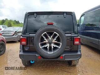 2024 Jeep Wrangler Willys z VIN 1C4RJXN60RW317717, wystawiony jako IAAI lot #42017788 z przebiegiem 10 096 mil mil oraz . Historia ofert i sprzedaży dostępna na DreamBid. Obrazek 16.