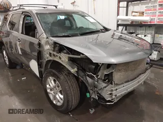 2020 Chevrolet Traverse LT with VIN 1GNEVHKW9LJ176834, listed as a IAAI auction lot 42211350 with 100,188 mi miles and . Bid and sale history available at DreamBid. Image 6.