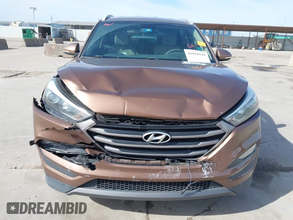 2016 Hyundai Tucson Limited with VIN KM8J33A20GU137662, listed as a IAAI auction lot 41818149 with 120,010 mi miles. Bid and sale history available at carsss.com. Image 12.