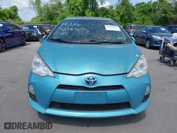 2014 Toyota Prius One with VIN JTDKDTB30E1077183, listed as a IAAI auction lot 42183675 with 92,560 mi miles and . Bid and sale history available at DreamBid. Image 12.