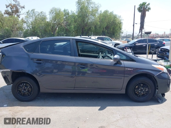 2015 Toyota Prius Four with VIN JTDKN3DU9F0473025, listed as a IAAI auction lot 42425733 with 124,196 mi miles and . Bid and sale history available at DreamBid. Image 13.