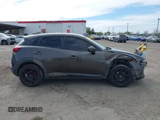2016 Mazda CX-3 Sport z VIN JM1DKBB75G0114507, wystawiony jako IAAI lot #41858416 z przebiegiem 152 822 mil mil oraz . Historia ofert i sprzedaży dostępna na DreamBid. Obrazek 13.