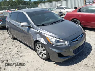 2014 Hyundai Accent SE z VIN KMHCU5AE9EU142285, wystawiony jako IAAI lot #42036366 z przebiegiem 138 422 mil mil oraz . Historia ofert i sprzedaży dostępna na DreamBid. Obrazek 1.