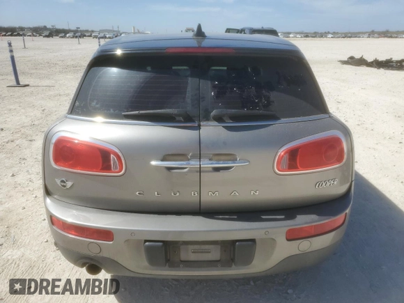 2016 MINI Clubman z VIN WMWLN5C57G2B28303, wystawiony jako Copart lot #56638375 z przebiegiem 130 262 mil mil oraz Szkoda całkowita • Salvage title. Historia ofert i sprzedaży dostępna na DreamBid. Obrazek 6.