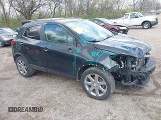 2014 Buick Encore Leather with VIN KL4CJCSB2EB751665, listed as a IAAI auction lot 41972107 with 94,177 mi miles and . Bid and sale history available at carsss.com. Image 1.