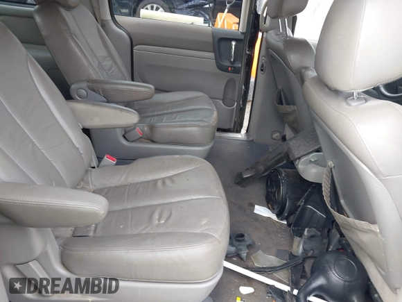 2010 Kia Sedona EX with VIN KNDMH4C33A6342127, listed as a IAAI auction lot 41570657 with 249,395 mi miles. Bid and sale history available at carsss.com. Image 8.