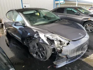 2023 Tesla Model 3 with VIN 5YJ3E1EA0PF449499, listed as a Copart auction lot 52900515 with 42,706 mi miles and Non Repairable. Bid and sale history available at DreamBid. Image 4.