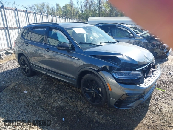 2024 Volkswagen Tiguan SE R-Line Black with VIN 3VVCB7AX2RM114556, listed as a IAAI auction lot 41887373 with 7,013 mi miles and . Bid and sale history available at DreamBid. Image 1.