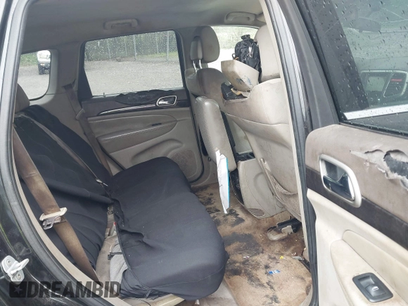 2011 Jeep Grand Cherokee Laredo with VIN 1J4RS4GG7BC569287, listed as a IAAI auction lot 41915092 with 211,148 mi miles and . Bid and sale history available at DreamBid. Image 8.