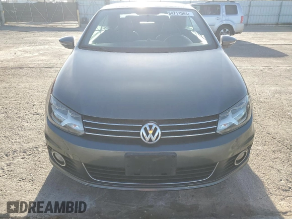 2012 Volkswagen Eos Komfort с VIN WVWBW7AH1CV006501, выставлен на аукционе Copart как лот 84711084 с пробегом 106 113 миль миль и Списание • Salvage title. История ставок и продаж доступна на DreamBid. Изображение 5.