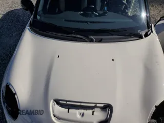 2015 MINI Roadster S z VIN WMWSY3C56FT595466, wystawiony jako Copart lot #69655944 z przebiegiem 53 971 mil mil oraz Szkody całkowita. Historia ofert i sprzedaży dostępna na DreamBid. Obrazek 11.