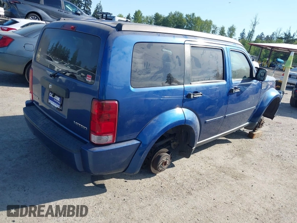 2010 Dodge Nitro SE with VIN 1D4PT2GK4AW141616, listed as a IAAI auction lot 42183953 with 128,023 mi miles. Bid and sale history available at carsss.com. Image 4.