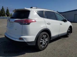 2017 Toyota RAV4 LE with VIN JTMZFREV1HJ104274, listed as a Copart auction lot 55679985 with 105,660 mi miles and Salvage Title. Bid and sale history available at DreamBid. Image 3.