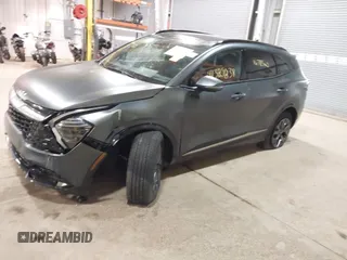 2023 Kia Sportage SX-Prestige with VIN KNDPXCAG7P7094340, listed as a IAAI auction lot 41389838 with 16,785 mi miles and . Bid and sale history available at DreamBid. Image 2.