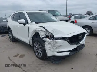 2019 Mazda CX-5 Grand Touring with VIN JM3KFADMXK0681756, listed as a IAAI auction lot 41533657 with 66,195 mi miles. Bid and sale history available at carsss.com. Image 1.
