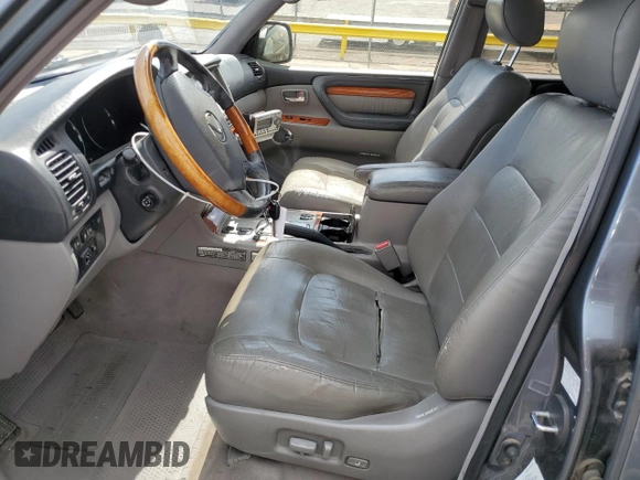 2003 Lexus LX 470 z VIN JTJHT00W633531685, wystawiony jako Copart lot #49729305 z przebiegiem 237 447 mil mil oraz Szkoda całkowita • Salvage title. Historia ofert i sprzedaży dostępna na DreamBid. Obrazek 7.
