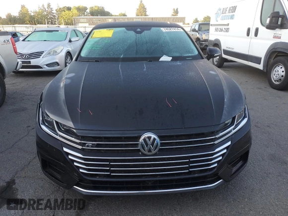 2019 Volkswagen Arteon SEL Premium R-Line с VIN WVWTR7AN0KE000513, выставлен на аукционе Copart как лот 74527414 с пробегом 60 521 миль миль и Списание • Salvage title. История ставок и продаж доступна на DreamBid. Изображение 5.