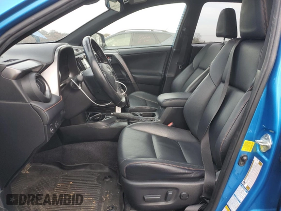 2017 Toyota RAV4 Hybrid SE with VIN JTMJJREV1HD120971, listed as a Copart auction lot 86187384 with 79,887 mi miles and Salvage Title. Bid and sale history available at carsss.com. Image 7.