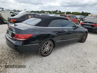 2015 Mercedes-Benz E 400 with VIN WDDKK6FF4FF304607, listed as a Copart auction lot 80517184 with 111,537 mi miles and Salvage title. Bid and sale history available at DreamBid. Image 3.