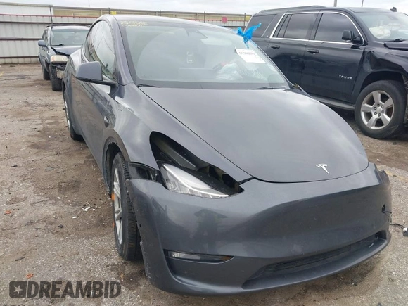 2023 Tesla Model Y Long Range with VIN 7SAYGAEE8PF587202, listed as a IAAI auction lot 41306811 with 1 mi miles. Bid and sale history available at carsss.com. Image 1.