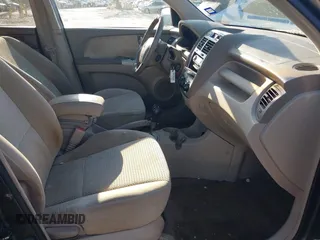2005 Kia Sportage LX z VIN KNDJF723757132772, wystawiony jako IAAI lot #41436925 z przebiegiem 134 653 mil mil oraz . Historia ofert i sprzedaży dostępna na DreamBid. Obrazek 5.