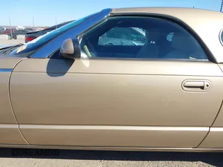 2005 Ford Thunderbird Deluxe with VIN 1FAHP60A45Y100899, listed as a IAAI auction lot 41803706 with 75,319 mi miles. Bid and sale history available at carsss.com. Image 15.