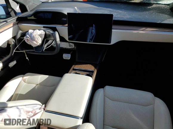 2023 Tesla Model X with VIN 7SAXCBE54PF426469, listed as a Copart auction lot 51019955 with Not Provided miles and Salvage Title. Bid and sale history available at DreamBid. Image 8.