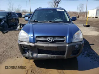 2005 Hyundai Tucson GL with VIN KM8JM72D55U167063, listed as a Copart auction lot 52002865 with 157,945 mi miles and Salvage Title. Bid and sale history available at carsss.com. Image 5.