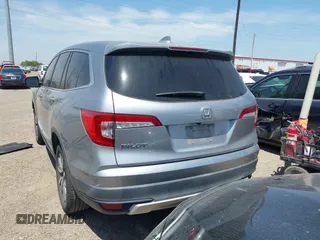 2020 Honda Pilot EX-L z VIN 5FNYF5H52LB007696, wystawiony jako IAAI lot #42065587 z przebiegiem 74 781 mil mil oraz . Historia ofert i sprzedaży dostępna na DreamBid. Obrazek 3.