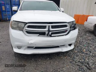 2013 Dodge Durango R/T with VIN 1C4SDHCT6DC672487, listed as a IAAI auction lot 42242172 with 185,074 mi miles and . Bid and sale history available at DreamBid. Image 18.