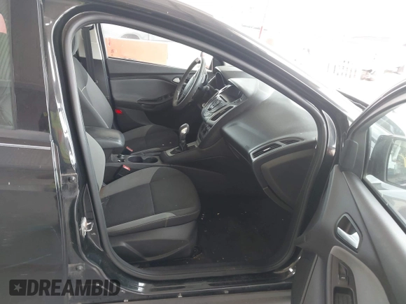 2013 Ford Focus SE z VIN 1FADP3F27DL343387, wystawiony jako IAAI lot #42409706 z przebiegiem 139 164 mil mil oraz . Historia ofert i sprzedaży dostępna na DreamBid. Obrazek 5.