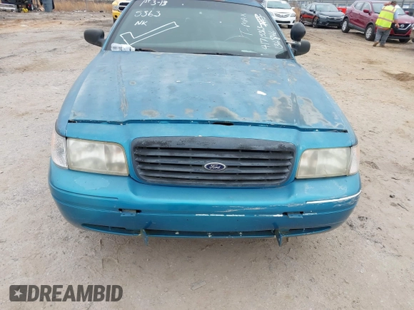 2000 Ford Crown Victoria Police Interceptor z VIN 2FAFP71W4YX136846, wystawiony jako IAAI lot #41715363 z przebiegiem 335 956 mil mil oraz . Historia ofert i sprzedaży dostępna na DreamBid. Obrazek 13.