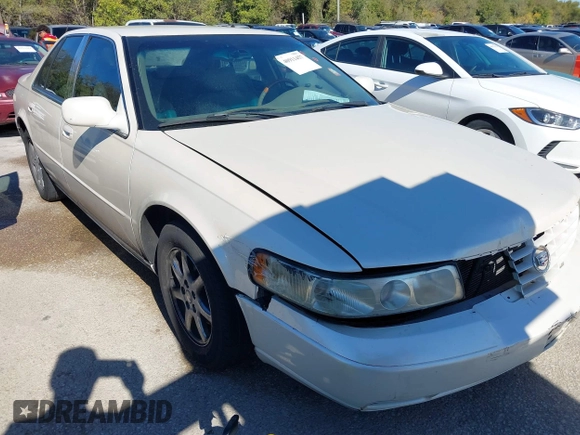 2002 Cadillac Seville Luxury SLS z VIN 1G6KS54Y52U231880, wystawiony jako IAAI lot #40911457 z przebiegiem 148 100 mil mil oraz . Historia ofert i sprzedaży dostępna na DreamBid. Obrazek 1.