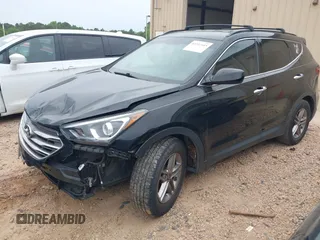 2017 Hyundai Santa Fe 2.4L z VIN 5NMZU3LB5HH029046, wystawiony jako IAAI lot #42212445 z przebiegiem 135 587 mil mil oraz . Historia ofert i sprzedaży dostępna na DreamBid. Obrazek 2.