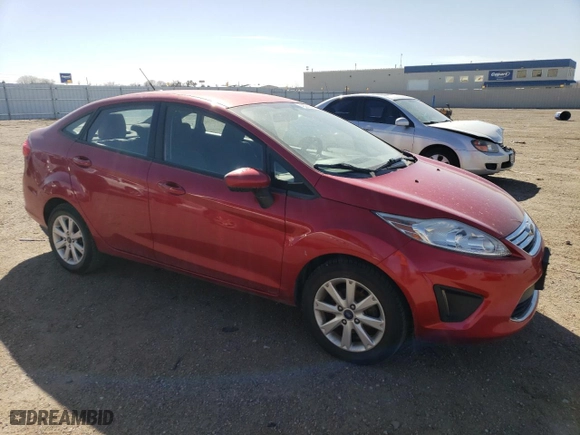 2012 Ford Fiesta SE with VIN 3FADP4BJ5CM131975, listed as a Copart auction lot 48992695 with 39,505 mi miles and Salvage Title. Bid and sale history available at carsss.com. Image 4.