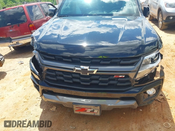 2022 Chevrolet Colorado 4WD Z71 z VIN 1GCGTDEN5N1327500, wystawiony jako IAAI lot #42265450 z przebiegiem 48 680 mil mil oraz . Historia ofert i sprzedaży dostępna na DreamBid. Obrazek 12.