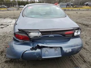 1999 Ford Taurus SE z VIN 1FAFP53U4XG150881, wystawiony jako Copart lot #40964564 z przebiegiem 124 928 mil mil oraz Tytuł czysty. Historia ofert i sprzedaży dostępna na DreamBid. Obrazek 6.
