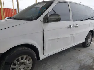 2003 Kia Sedona LX with VIN KNDUP131536402900, listed as a IAAI auction lot 41500260 with 143,825 mi miles and . Bid and sale history available at DreamBid. Image 13.