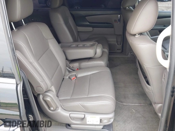 2015 Honda Odyssey Touring Elite with VIN 5FNRL5H97FB124565, listed as a IAAI auction lot 42358412 with 206,444 mi miles and . Bid and sale history available at DreamBid. Image 8.