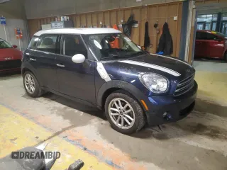 2015 MINI Countryman with VIN WMWZB3C53FWR43903, listed as a Copart auction lot 86384294 with 112,667 mi miles and Salvage Title. Bid and sale history available at DreamBid. Image 4.