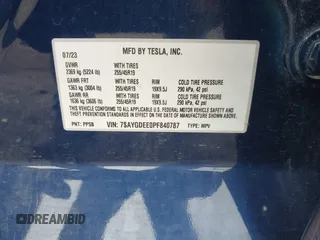 2023 Tesla Model Y Long Range z VIN 7SAYGDEE0PF840787, wystawiony jako IAAI lot #42172489 z przebiegiem 16 314 mil mil oraz . Historia ofert i sprzedaży dostępna na DreamBid. Obrazek 9.