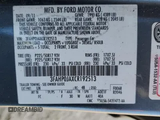 2012 Ford Fusion SEL z VIN 3FAHP0JAXCR192513, wystawiony jako Copart lot #48873205 z przebiegiem 163 110 mil mil oraz Szkoda całkowita • Salvage title. Historia ofert i sprzedaży dostępna na DreamBid. Obrazek 13.