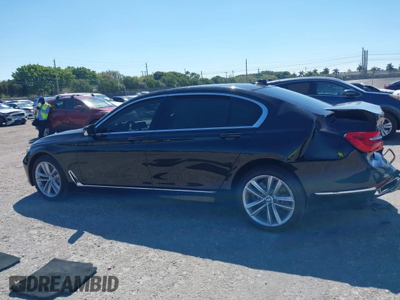 2018 BMW 7 Series 750i with VIN WBA7F0C54JGM22900, listed as a IAAI auction lot 41673673 with 66,264 mi miles. Bid and sale history available at carsss.com. Image 13.